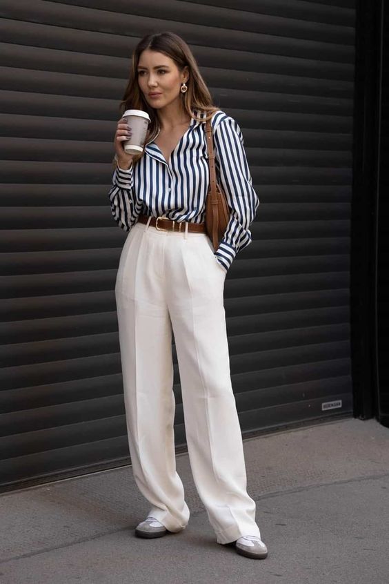 blue and white blouse with white Aritzia Effortless Pant